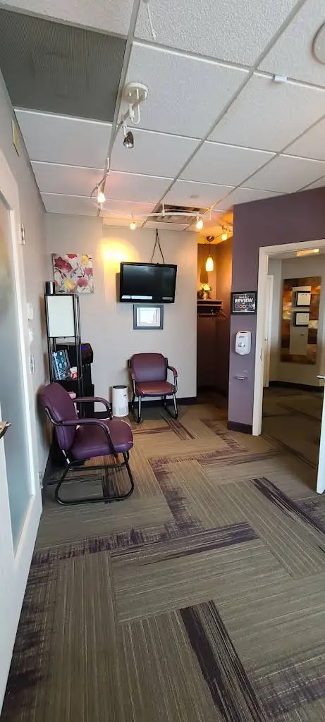 Smile Design Specialist - Professional dental clinic exterior with modern facilities