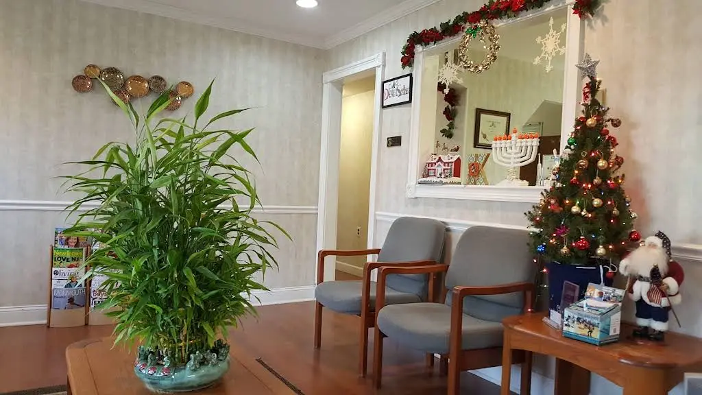 K Dental Smiles - Professional dental clinic exterior with modern facilities