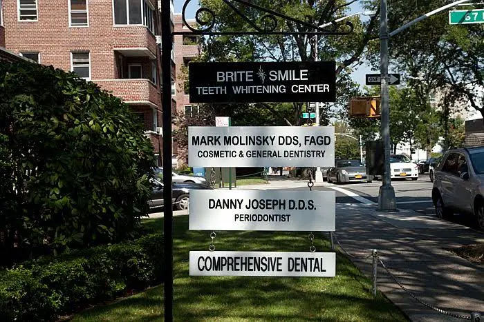 Queens Comprehensive Dental - Professional dental clinic exterior with modern facilities