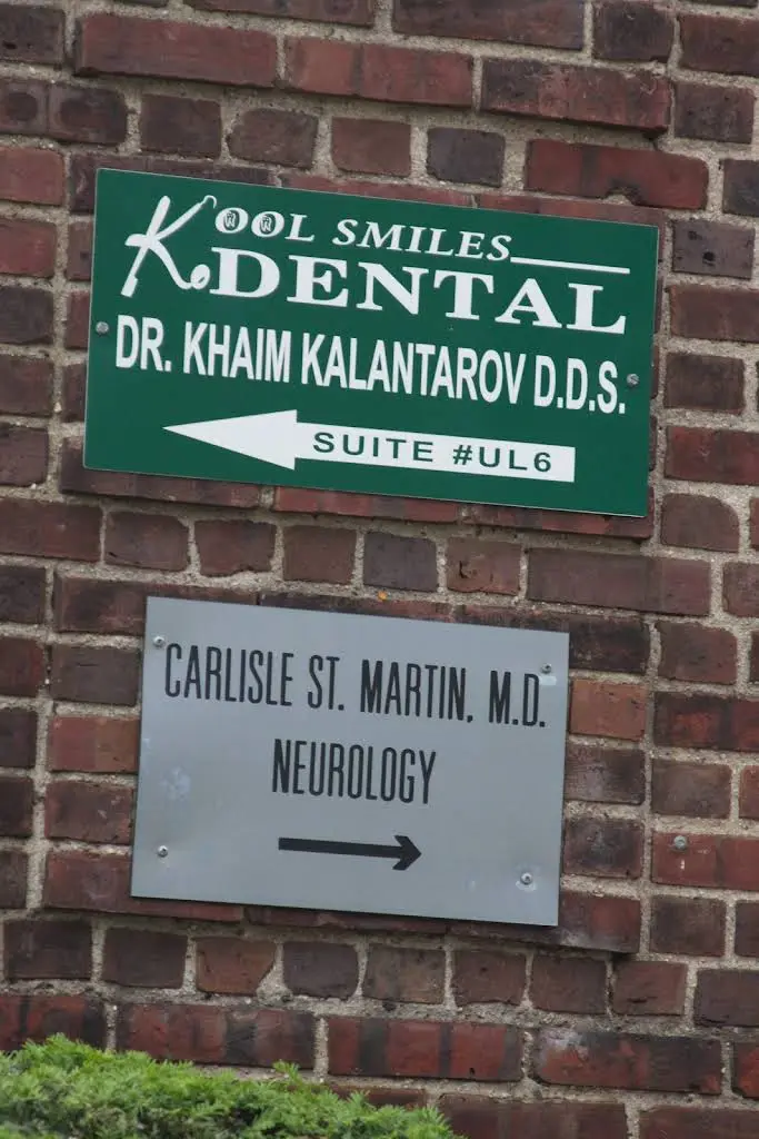 KOOL SMILES DENTAL - Professional dental clinic exterior with modern facilities