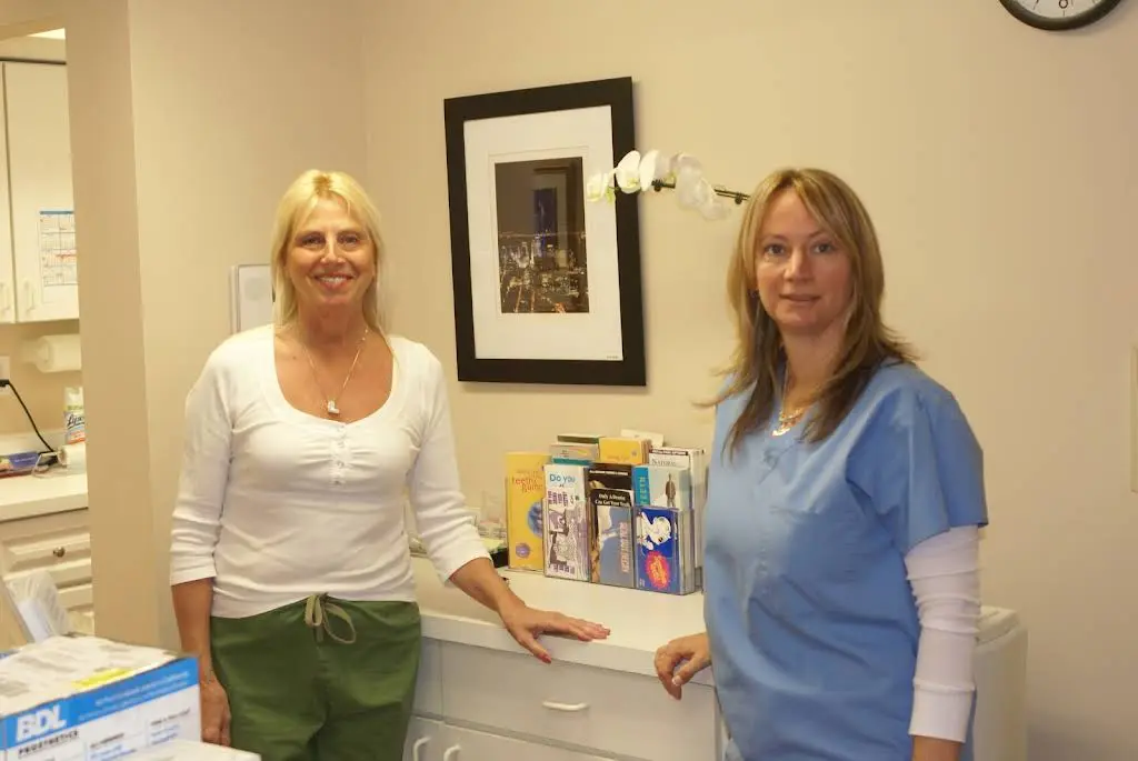 Advanced Dental Excellence - Professional dental clinic exterior with modern facilities