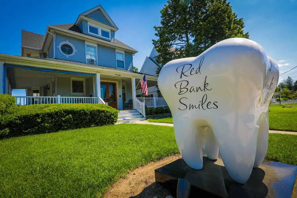 Red Bank Smiles - Professional dental clinic exterior with modern facilities