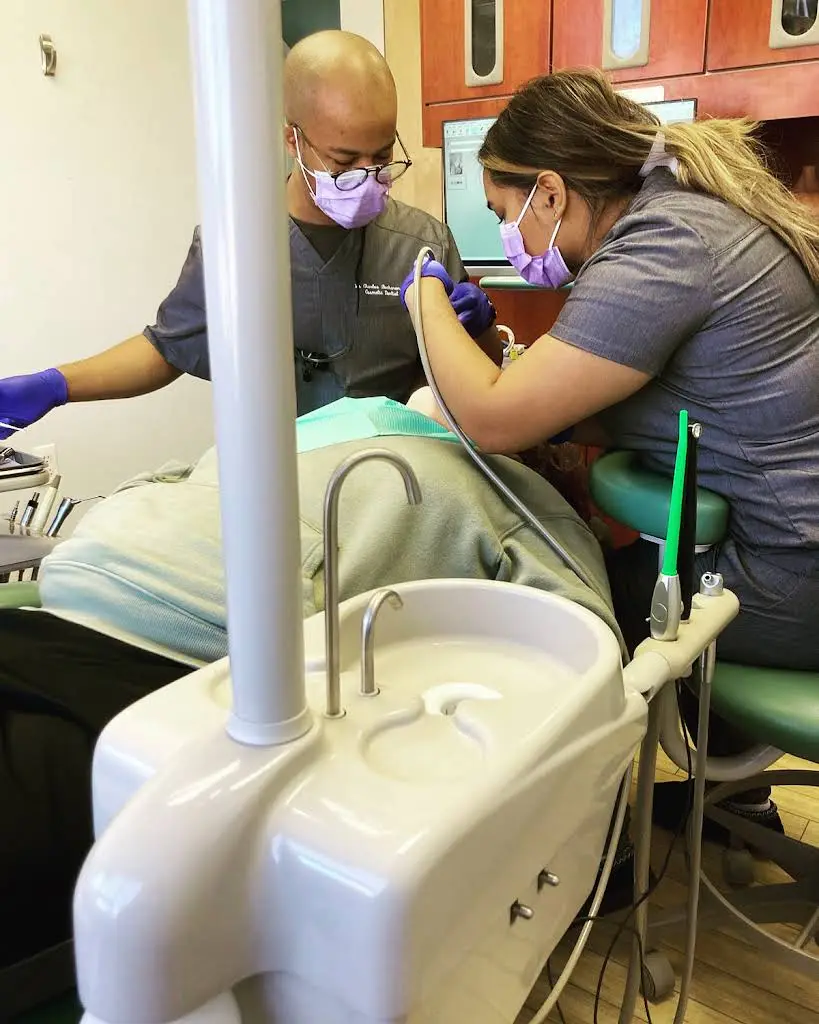 Queens Modern Dental Suite - Professional dental clinic exterior with modern facilities