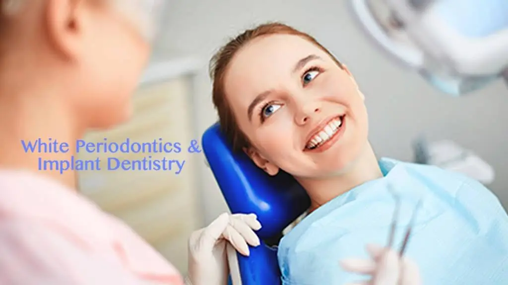 White Periodontics and Implant Dentistry - Professional dental clinic exterior with modern facilities