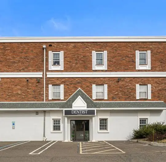 The Town Dentist: Paramus Emergency Dental and Implant Center - Professional dental clinic exterior with modern facilities