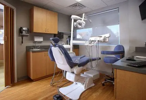Sunset Dental - Professional dental clinic exterior with modern facilities