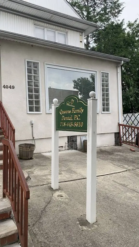 Queens Family Dental - Professional dental clinic exterior with modern facilities