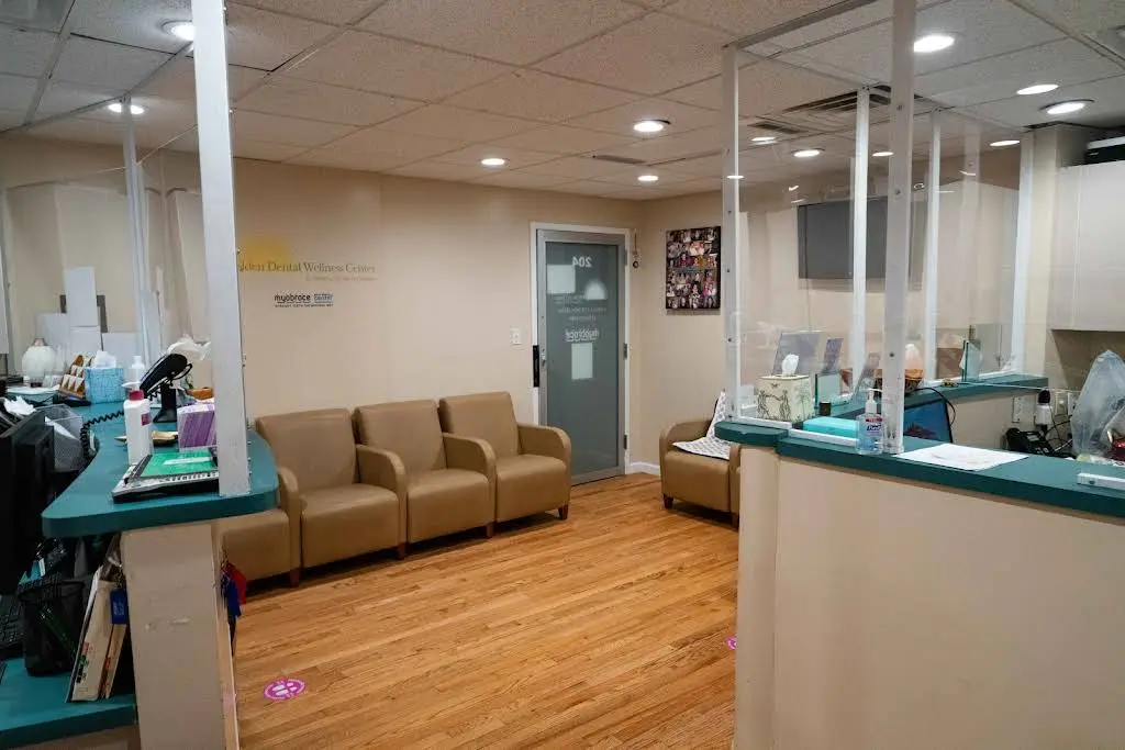 Golden Dental Wellness Center - Professional dental clinic exterior with modern facilities