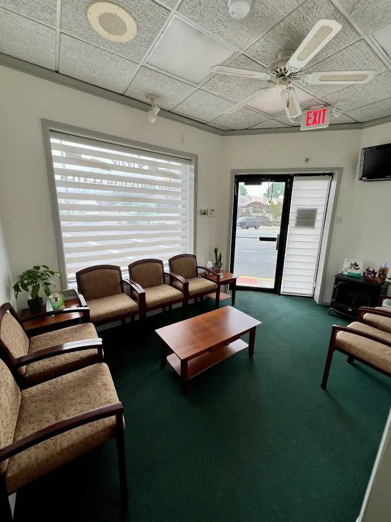 Cura Dental - Dr. Eddie Rosario - Professional dental clinic exterior with modern facilities