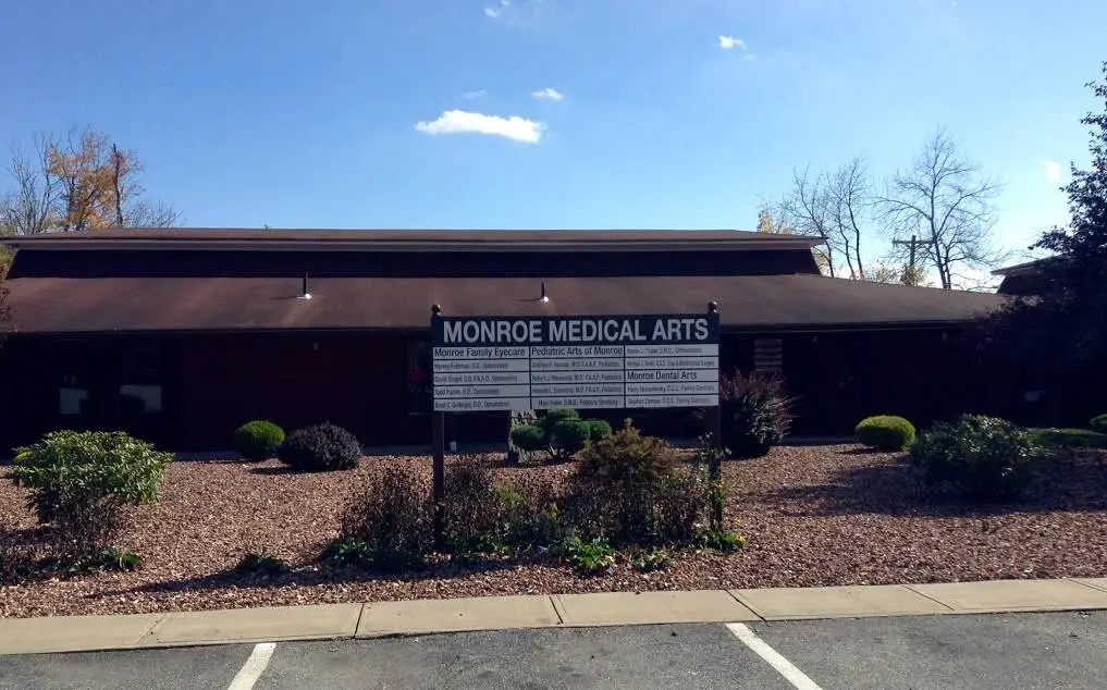 Monroe Dental Arts - Professional dental clinic exterior with modern facilities