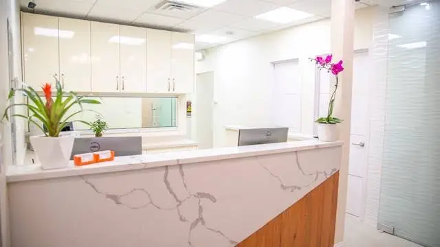 Bond Orthodontics & Dental Care PLLC - Professional dental clinic exterior with modern facilities