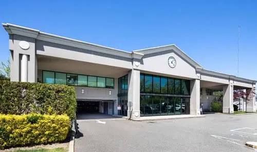Garden City Center for Dental Excellence - Professional dental clinic exterior with modern facilities