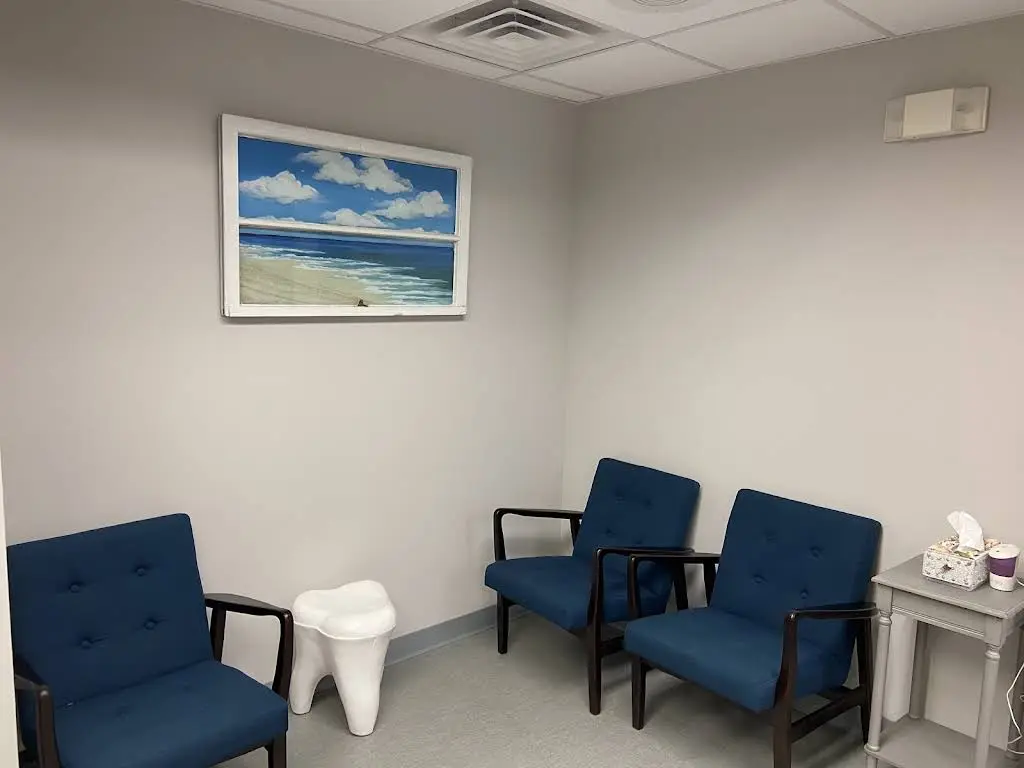 Dental Smile Creations - Dr. Gina Sajnani - Professional dental clinic exterior with modern facilities