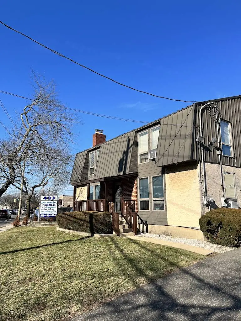 East Meadow Dental Associates - Professional dental clinic exterior with modern facilities