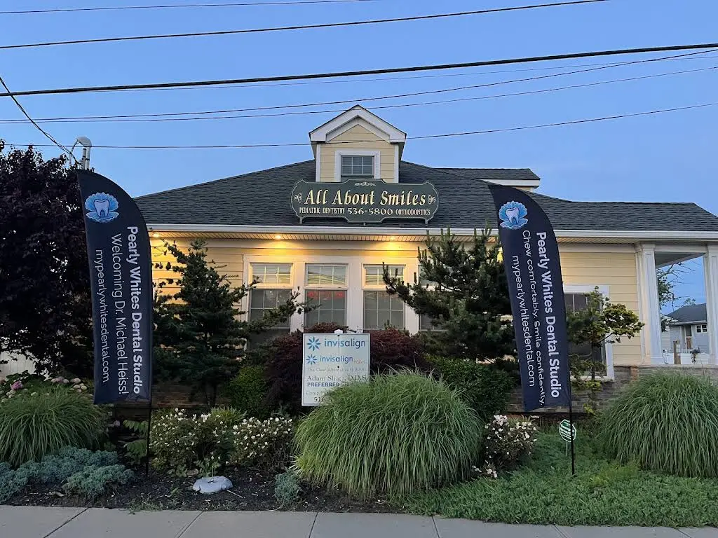 Pearly Whites Dental Studio - Professional dental clinic exterior with modern facilities