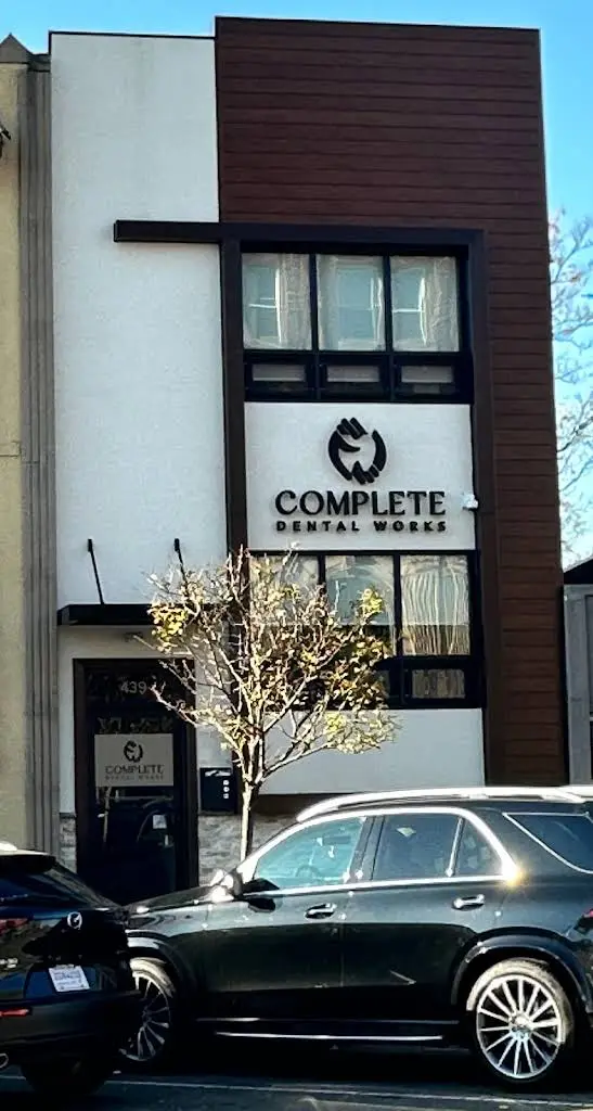 Complete Dental Works - Professional dental clinic exterior with modern facilities