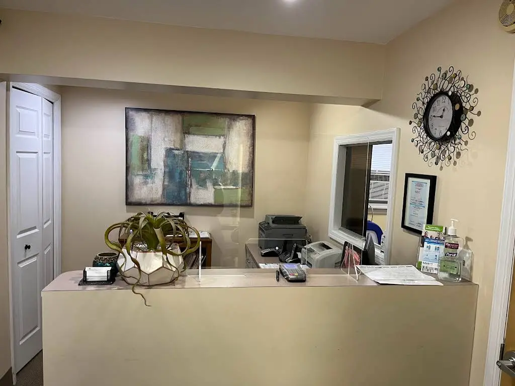 Hudson Family Smiles - Professional dental clinic exterior with modern facilities