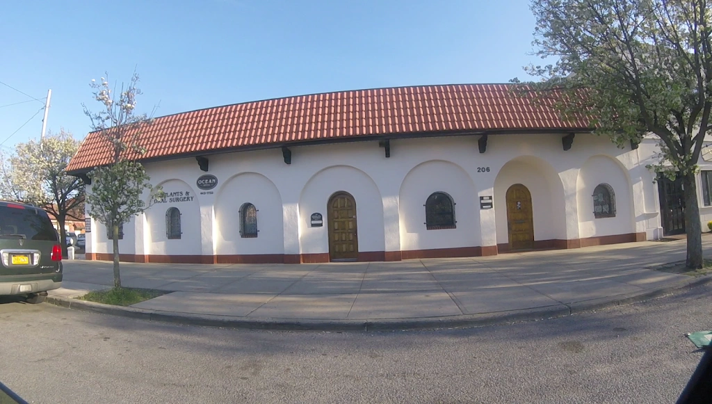Ocean Implants & Oral Surgery - Professional dental clinic exterior with modern facilities