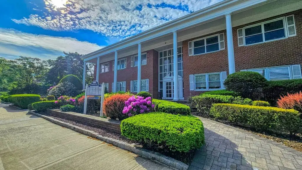 Port Smiles - Professional dental clinic exterior with modern facilities