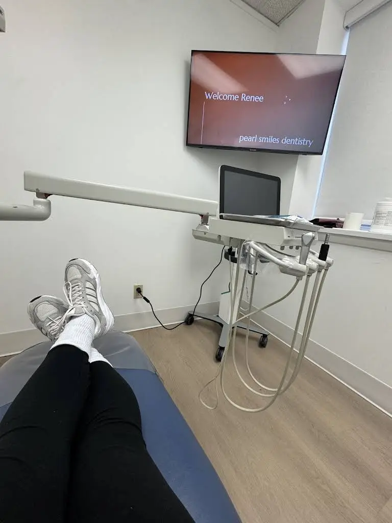 Pearl Smiles Dentistry - Professional dental clinic exterior with modern facilities