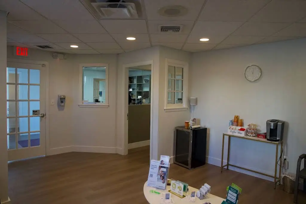 Genuine Smiles - Professional dental clinic exterior with modern facilities