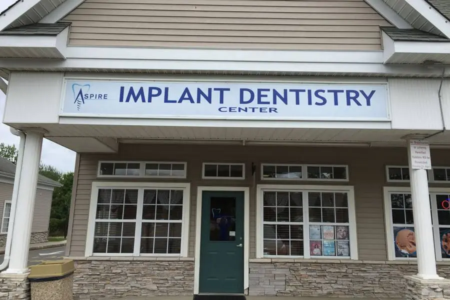 Aspire Implant Dentistry Center - Professional dental clinic exterior with modern facilities