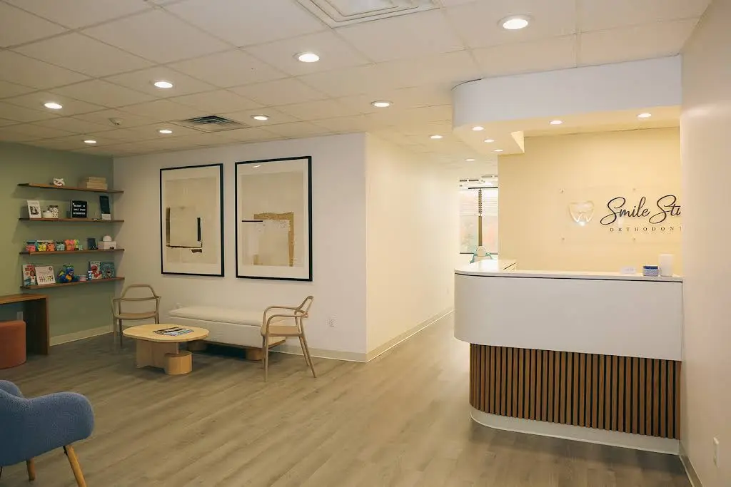 Smile Studio Orthodontics - Professional dental clinic exterior with modern facilities
