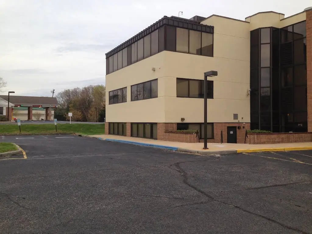 Progressive Periodontics and Implant Dentistry - Professional dental clinic exterior with modern facilities