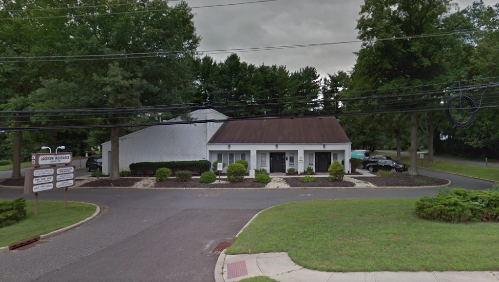 Jackson Dental - Dr. Farida Ali - Professional dental clinic exterior with modern facilities