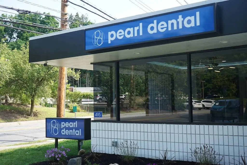 Pearl Dental - Professional dental clinic exterior with modern facilities