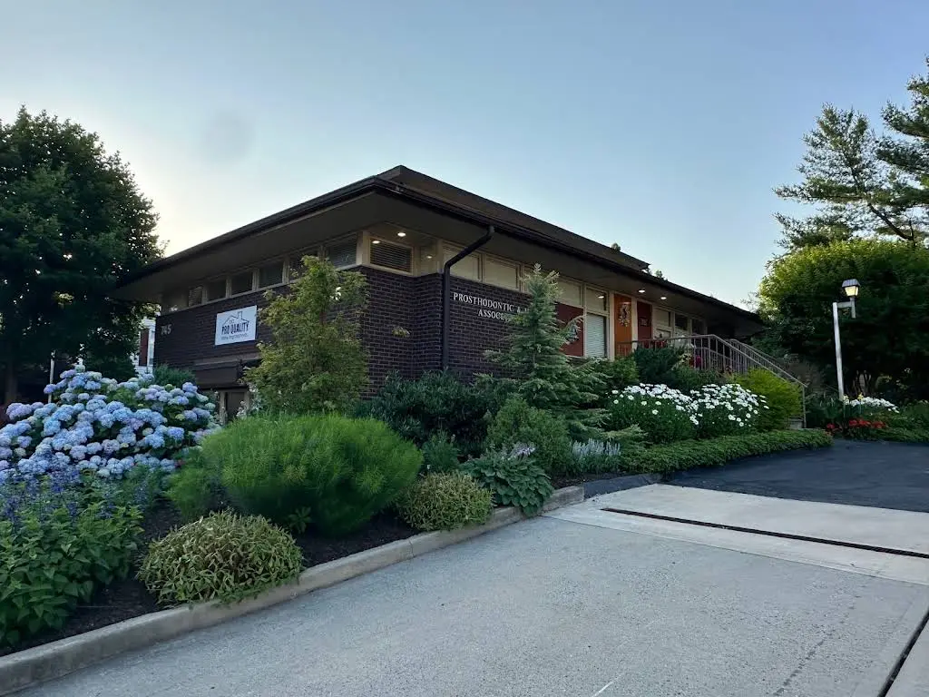 Prosthodontic & Implant Associates - Professional dental clinic exterior with modern facilities