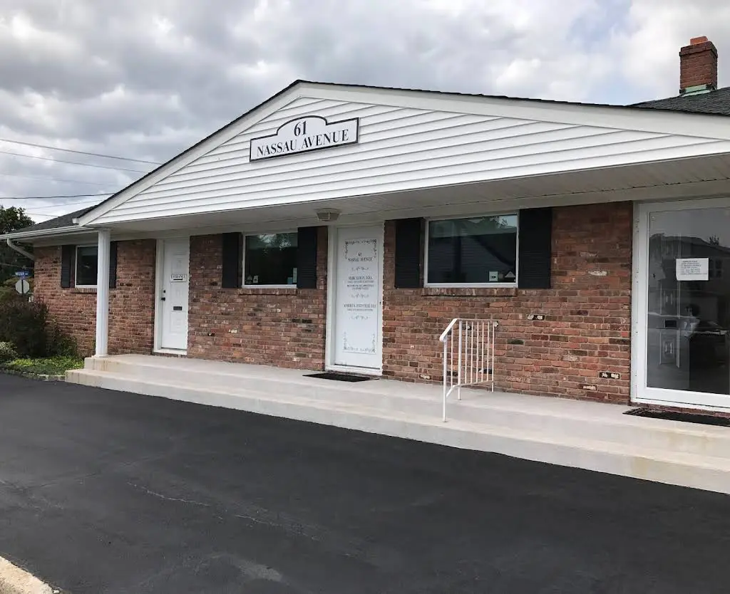 Kimberly K Justus, DDS - Professional dental clinic exterior with modern facilities
