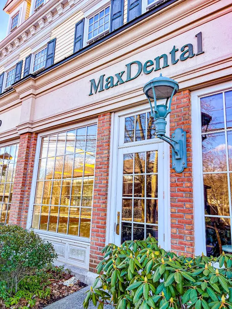 MaxDental - Professional dental clinic exterior with modern facilities