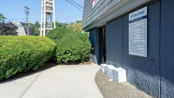 Periodontics & Implant Dentistry Center - Professional dental clinic exterior with modern facilities