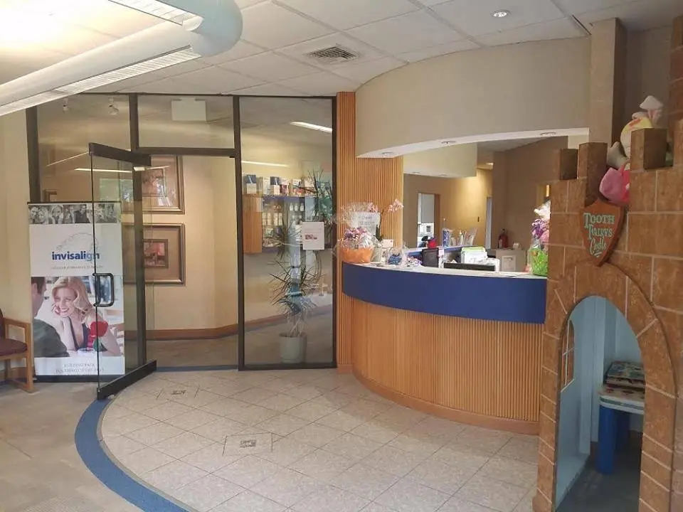 Dr. Munroe's Dental Center - Professional dental clinic exterior with modern facilities