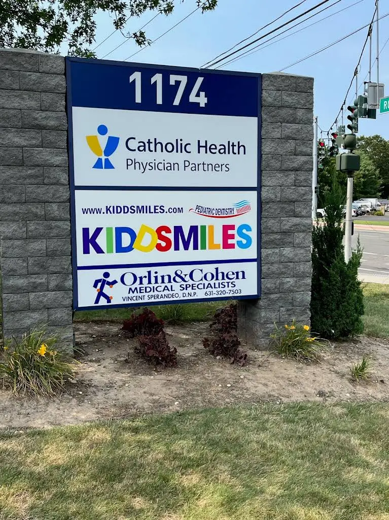 Kiddsmiles Pediatric Dentistry - Professional dental clinic exterior with modern facilities