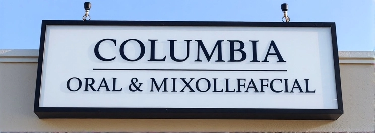 Columbia Oral & Maxillofacial - Professional dental clinic exterior with modern facilities
