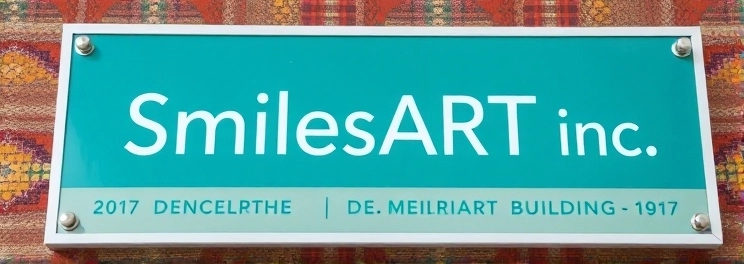 SmilesART Inc. - Professional dental clinic exterior with modern facilities